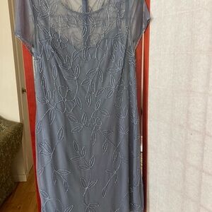 Made by Papell Studio. Pretty dressy dress with sequins and beautiful details.